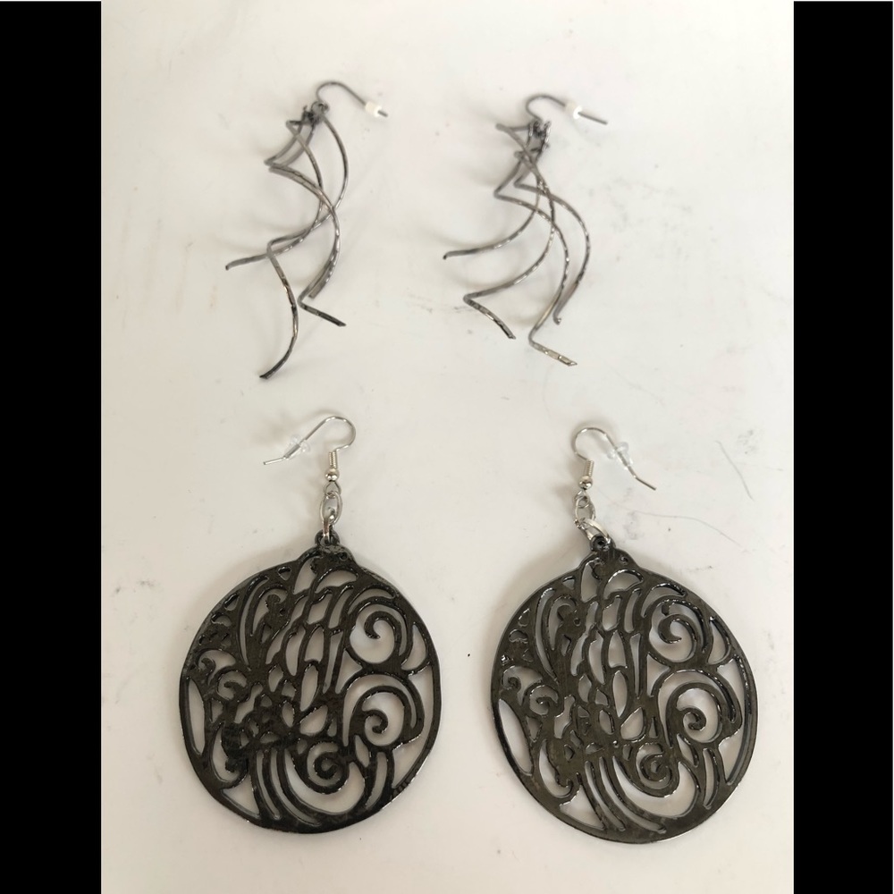 Black whispy and lazer-cut earrings